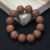 Wood Bead Bracelet with Engraved Charms and Tassel