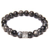 Round stone bead bracelet with a square silver-tone swastika charm in the center