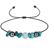 Black cord bracelet with teal and grey stone beads