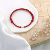 Woven Red String Bracelet with Gold-Tone Bead