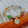 Five Wealth Deities Liuli Glass Charm Bracelet with Gold-tone Foil Beads
