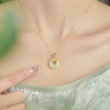 Lotus Peace Buckle Necklace with Gold-Tone Chain and Gemstone Pendant