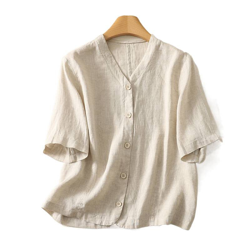 Beige linen blend short sleeve shirt with buttons on a hanger