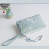Embroidered Canvas Clutch Purse with Floral Motifs