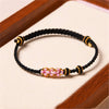 Handmade Peach Blossom Protection Braided Rope Bracelet