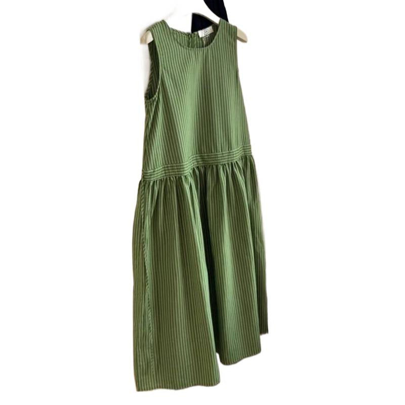 Green striped sleeveless cotton dress hanging on a wooden hanger