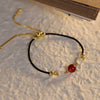 Red Agate Cat Eye Braided String Confidence Bracelet