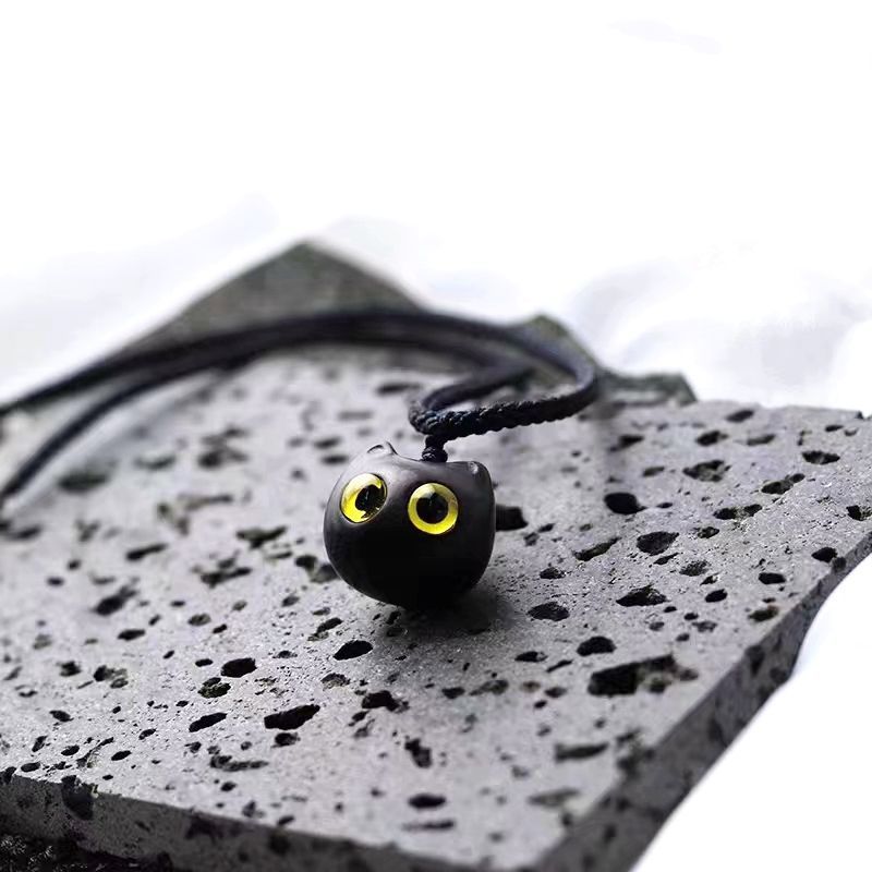 Ebony Wood Cat Necklace with Blue, Yellow or Heterochromic Eyes