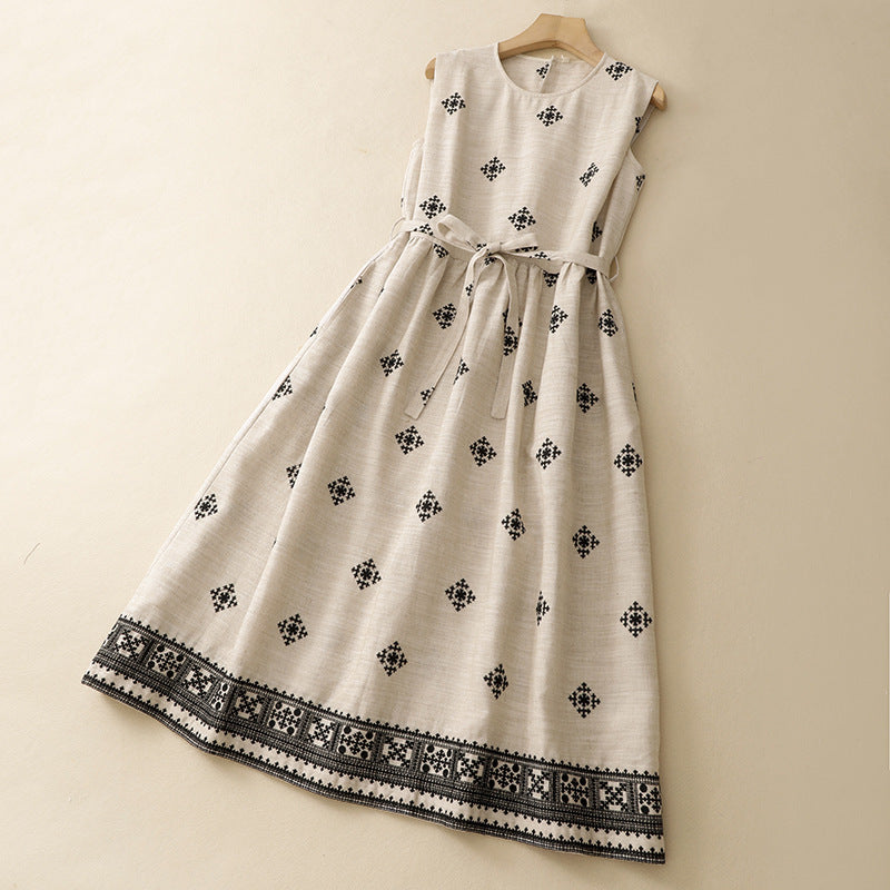 Beige sleeveless linen dress with black geometric pattern and drawstring waist