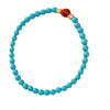 A circular bracelet made of turquoise beads with one red bead and gold accents on a white background