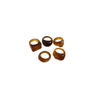 Five brown geometric resin rings arranged on a white surface