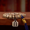Carved Bone Bead Bracelet with Tassel Charm