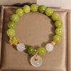 Tourmaline Crystal Bracelet with Peace Buckle Charm