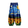 Women wearing loose harem pants with blue swirl and yellow sunflower print