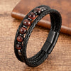 Close up of a black braided leather bracelet with brown tiger eye beads