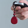 Cinnabar Keychain with Traditional Chinese Motifs