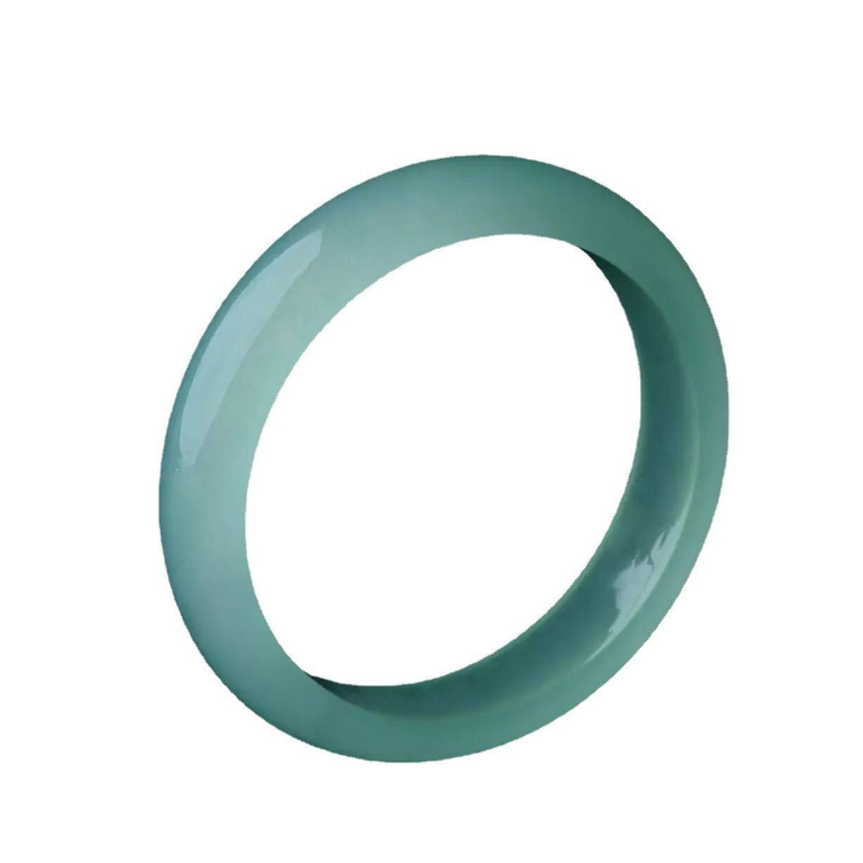 A smooth light green quartz jade bangle bracelet on a white background