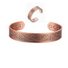 Open cuff bracelet with copper finish and engraved tree of life pattern