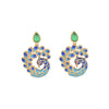 Pair of gold-tone peacock earrings with blue enamel and green agate stones on a wooden surface