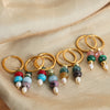Gold tone hoop earrings with colorful natural stone beads and white pearl drops