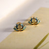 Gold-tone and blue enamel lotus flower stud earrings with a jade center