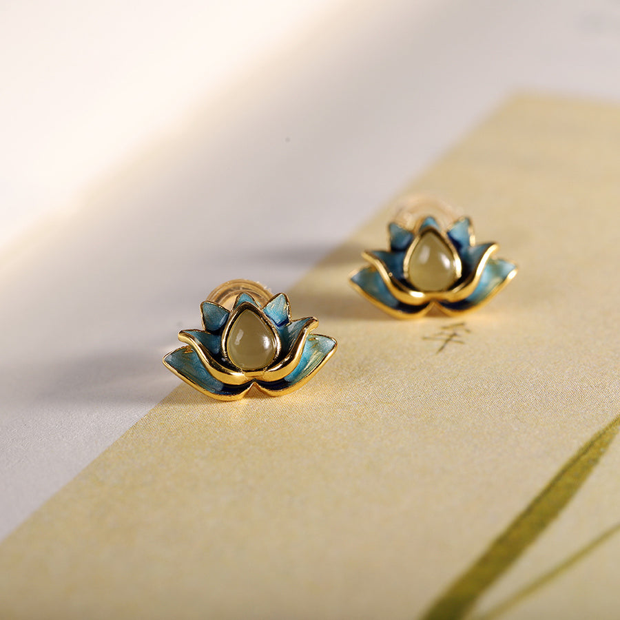 Gold-tone and blue enamel lotus flower stud earrings with a jade center