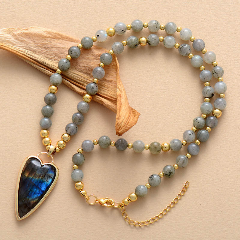 Handmade beaded necklace with a heart-shaped Labradorite pendant and gold-tone accents