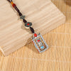 Handwoven Keychain with Prayer Wheel and Vajra Charms