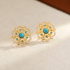Gold-Tone Floral Stud Earrings with Blue Stone Accents