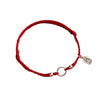 Braided red string bracelet with silver tone peace buckle and charm