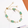 Handmade bracelet with green aventurine barrel beads and white baroque pearls on a gold-tone chain
