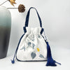 Embroidered Drawstring Bucket Bag with Tassel, Floral and Animal Motifs