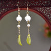 Long Drop Earrings with Floral Charm and Faux Pearl