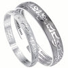 Silver tone open cuff bracelet with raised Tibetan script and engraved interior text