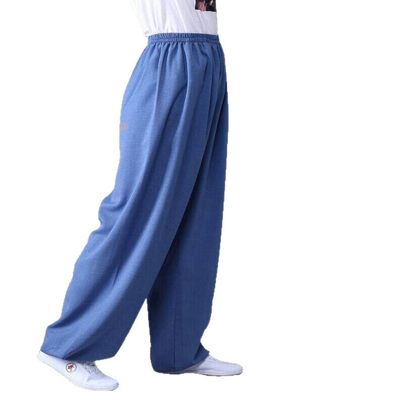 Side view of blue cotton linen Tai Chi pants with elastic waist