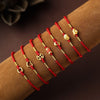 Red String Braided Bracelet with Gold-Tone Charm