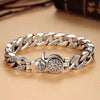 Silver plated chain bracelet with rotating Om Mani Padme Hum and Vajra centerpiece