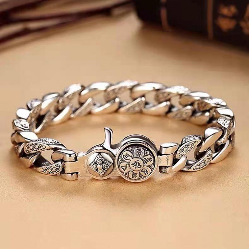 Silver plated chain bracelet with rotating Om Mani Padme Hum and Vajra centerpiece