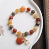 Golden Silk Jade Gourd Charm Bracelet