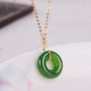 Green Jade Peace Buckle Necklace with Gold Tone Chain
