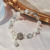 Crystal and Cat's Eye Charm Bracelet with Star, Moon and Flower Beads