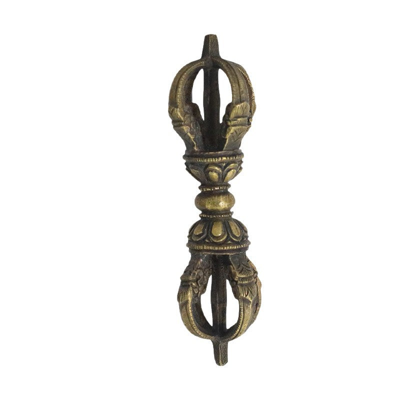 Close-up view of a handmade copper five-pronged vajra dorje with a bronze finish.