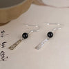 Silver Tone Floral Drop Earrings with Black Beads