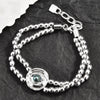 Silver-Plated Beaded Bracelet with Geometric Charms