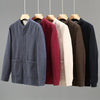 Five men's stand collar jackets in different colors hanging on wooden hangers
