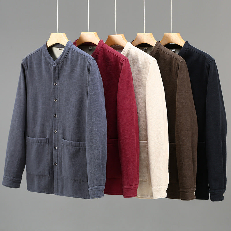 Five men's stand collar jackets in different colors hanging on wooden hangers