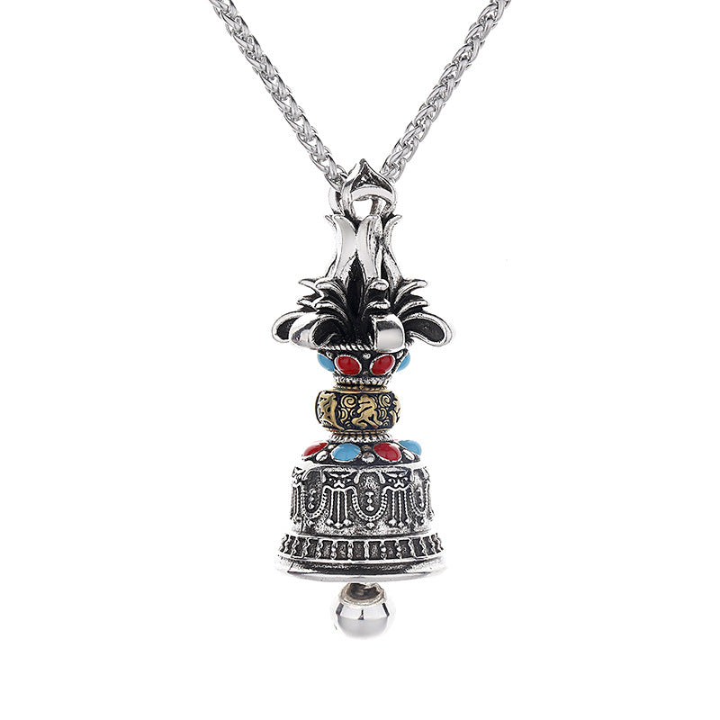Silver-tone copper pendant shaped like a vajra bell with colorful accents on a chain