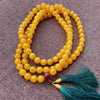 Yellow natural agate 108 bead mala necklace with green tassel