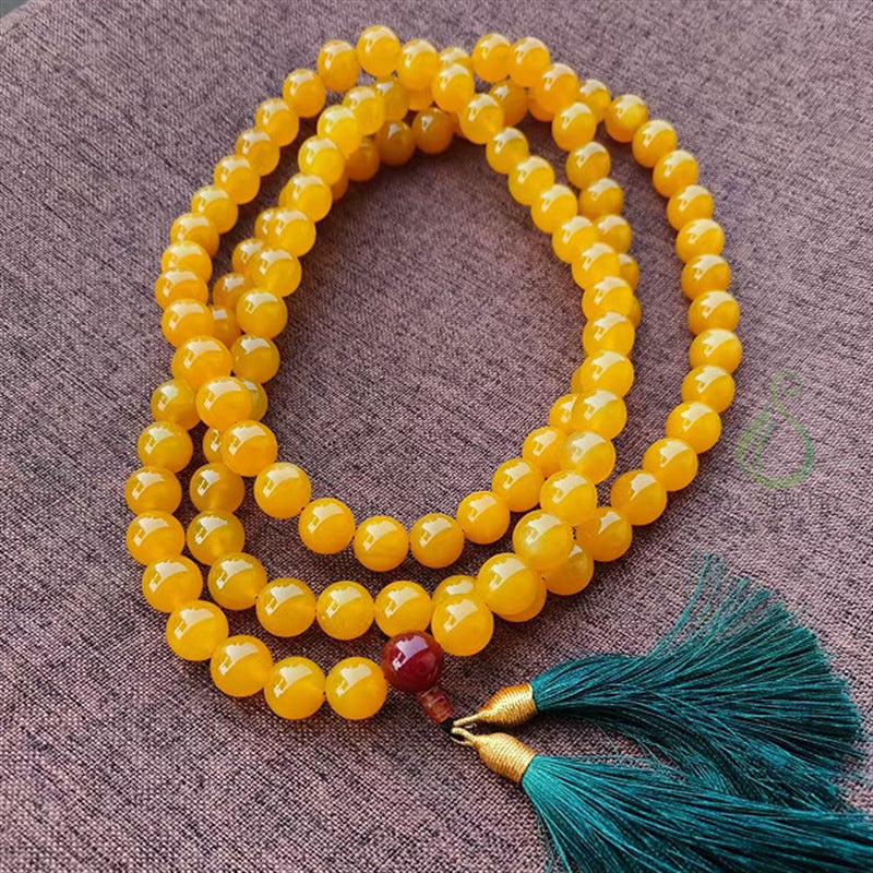 Yellow natural agate 108 bead mala necklace with green tassel