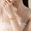 Bamboo Charm Bracelet with Glass Beads and Gold Tone Accents